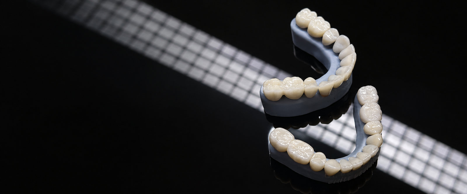 A zirconia crown being seated